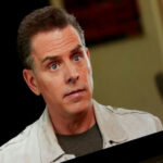 Hunter Biden BOMBSHELL: Shocking Biblical Exchange with Owens! Man in a beige jacket looking at the camera.