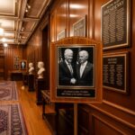 Did Epstein WIN The $85 Million Oklahoma Powerball?! An exhibit featuring a photo of Bill Clinton and Jeffrey Epstein in a wooden-paneled room