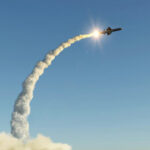 14,000 Km Missile: Russia’s Latest BLUFF? Missile launching into the sky with smoke trail.