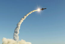 14,000 Km Missile: Russia’s Latest BLUFF? Missile launching into the sky with smoke trail.