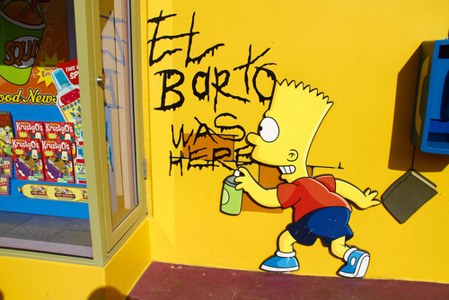 Los,Angeles,ca/usa,-,Oct,29,2014:,Mural,Art,Of,Bart,Simpson Graffiti of Bart Simpson writing El Barto was here on a yellow wall