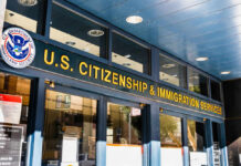 Immigration-Slavery Claim Sparks Firestorm US Citizenship and Immigration Services building entrance
